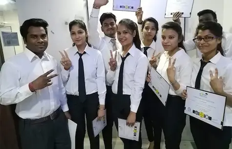 Students holding certificates after course completion at Oxford School of Accounting