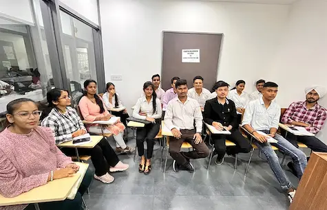 Students attending computer course classroom session at Oxford School of Accounting