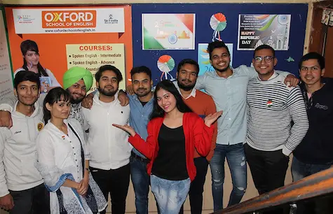 Group of Oxford students posing confidently after training
