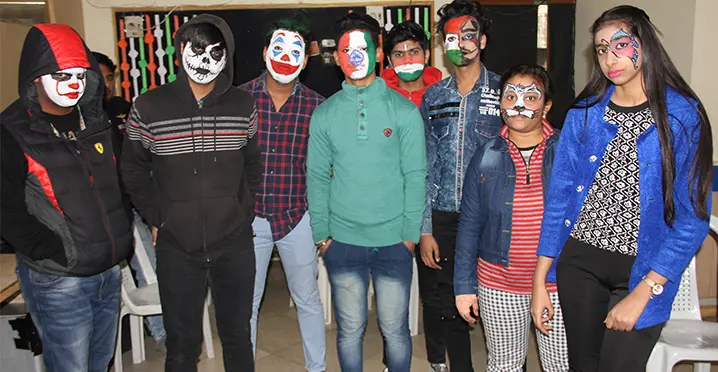Students showcasing creative face paint designs