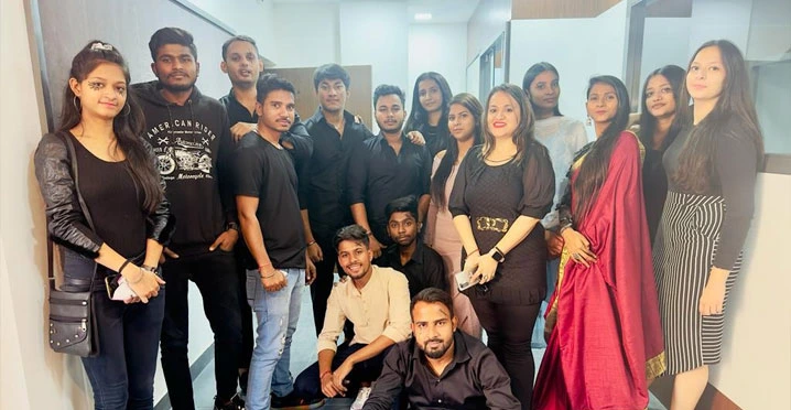 Students dressed in black posing after the talent show